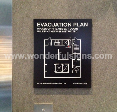 Elevator evacuation signs